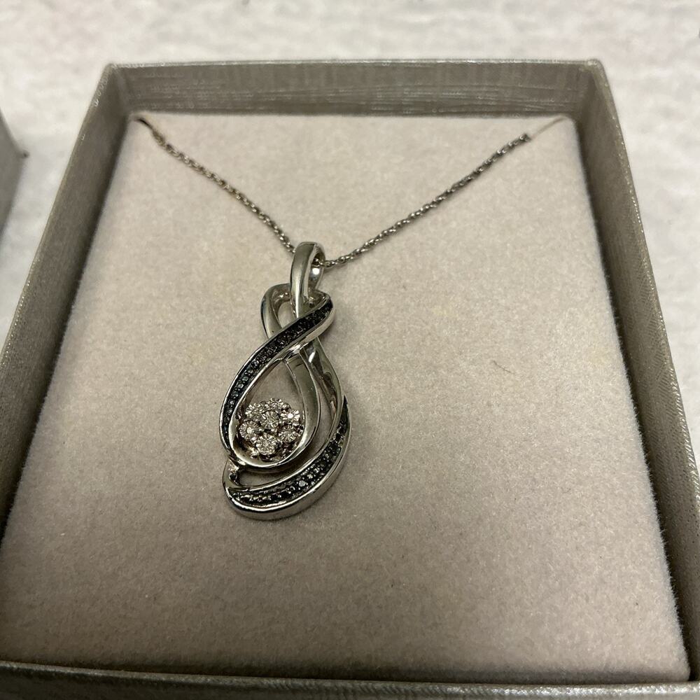Zales Sterling Silver Diamond Accent 7 Stone Infinity Pendant Necklace, 18" 3601